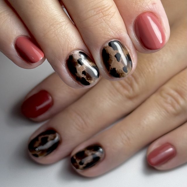 Coral nails with black and white leopard accents by The Nail Editor