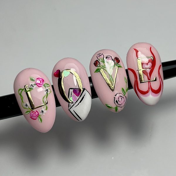 LOVE lettering Valentine nail art on tips by The Nail Editor