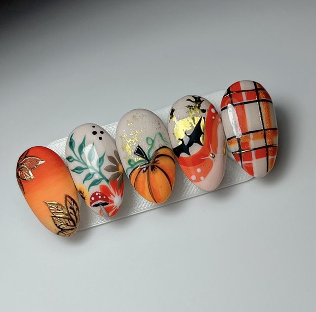 Autumn and Halloween nail art on display tips by The Nail Editor